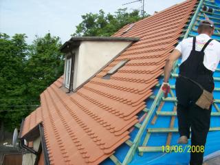 Remont dachu, domu wielorodzinnego